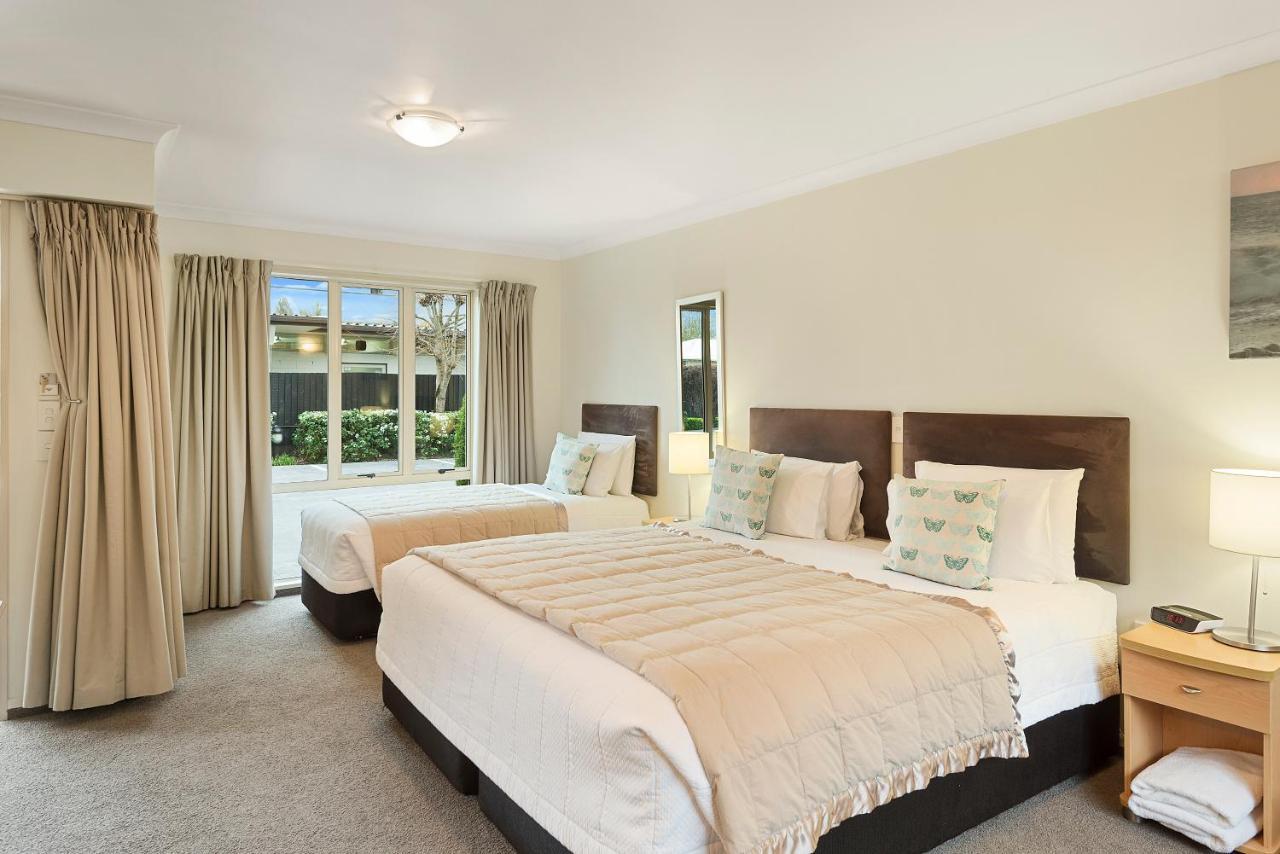 Colombo In The City Christchurch Exteriér fotografie A typical bedroom at the hotel